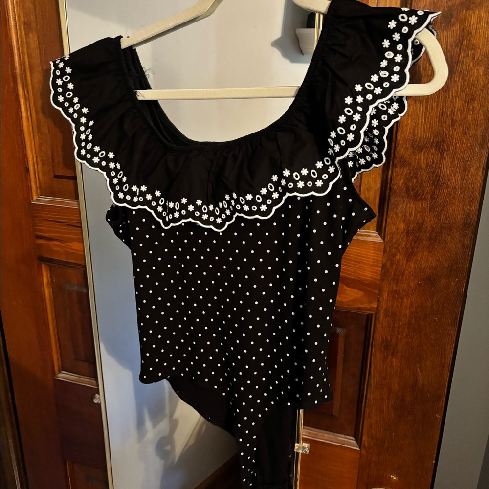 Black and white body suit